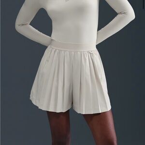 NWT- Nike 24.7 PerfectStretch
Women's Dri-FIT High-Waisted Loose Pleated Shorts